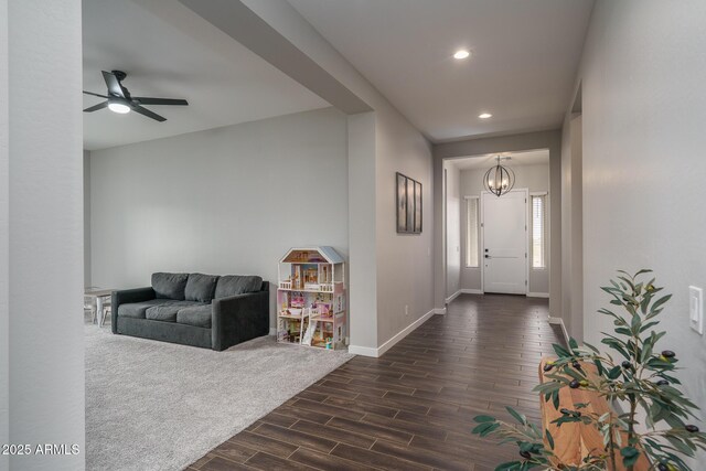 12702 W Sierra Vista Dr, Glendale, AZ 85307 - entryway with dark wood-style floors, ceiling fan with notable chandelier, baseboards, and recessed lighting