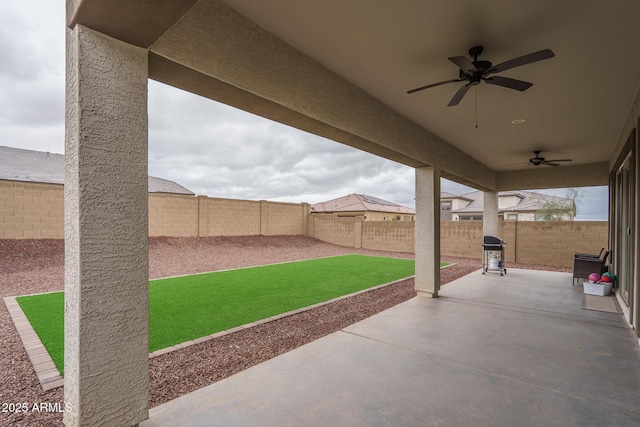 12702 W Sierra Vista Dr, Glendale, AZ 85307 - view of patio featuring a ceiling fan, a fenced backyard, and area for grilling