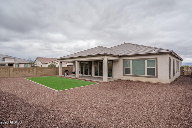 12702 W Sierra Vista Dr, Glendale, AZ 85307 - back of property featuring a patio area, a fenced backyard, and stucco siding