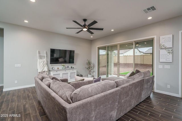 12702 W Sierra Vista Dr, Glendale, AZ 85307 - living room with wood tiled floor, visible vents, and recessed lighting