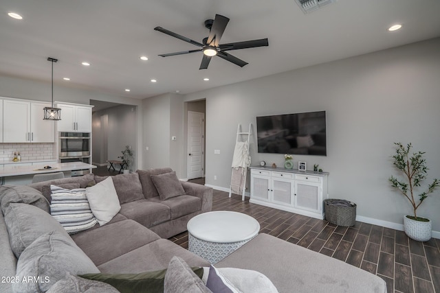 12702 W Sierra Vista Dr, Glendale, AZ 85307 - living room featuring recessed lighting, a ceiling fan, baseboards, visible vents, and wood tiled floor