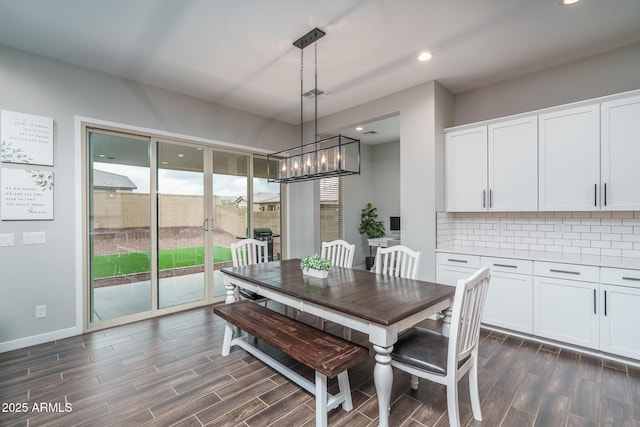 12702 W Sierra Vista Dr, Glendale, AZ 85307 - dining area with wood tiled floor, visible vents, baseboards, and recessed lighting