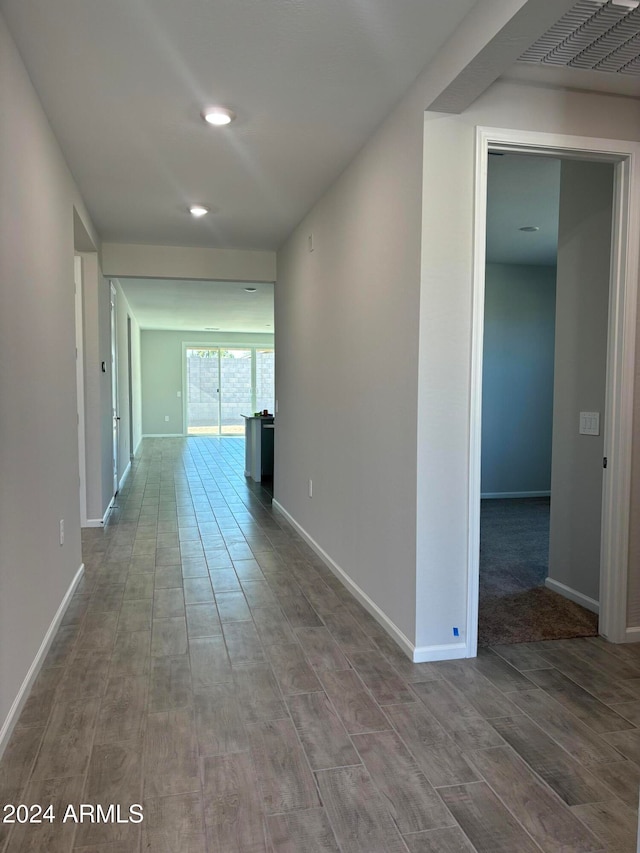 hall featuring wood-type flooring