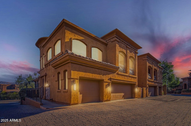 view of front of property featuring a garage