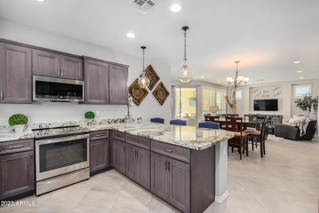 kitchen featuring kitchen peninsula, decorative light fixtures, stainless steel appliances, and dark brown cabinets