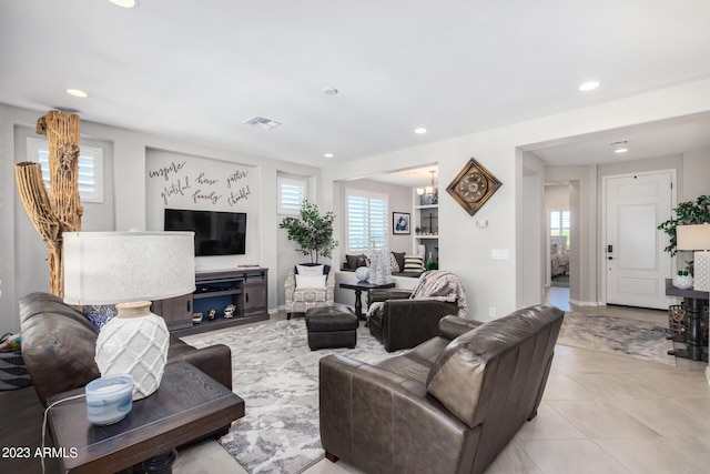 living room with light tile patterned flooring