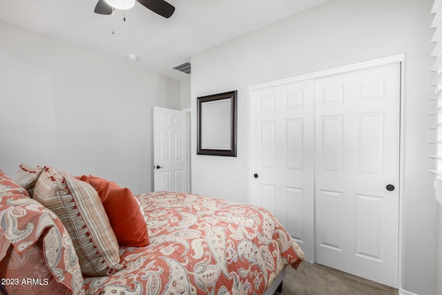 bedroom featuring carpet flooring, ceiling fan, and a closet