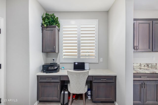 office area featuring built in desk