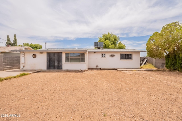 1654 E 2nd St, Mesa, AZ 85203 - back of house featuring central AC unit