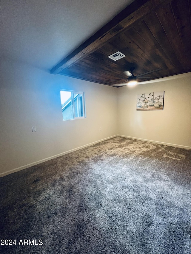 basement featuring carpet and wood ceiling