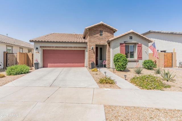 24638 N 144th Ave, Surprise, AZ 85387 - view of front of property with an attached garage, fence, stucco siding, a tiled roof, and driveway