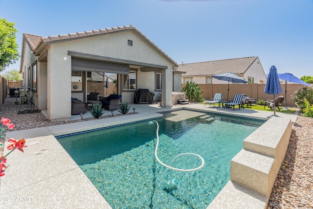 24638 N 144th Ave, Surprise, AZ 85387 - view of swimming pool with a patio, a fenced backyard, and grilling area