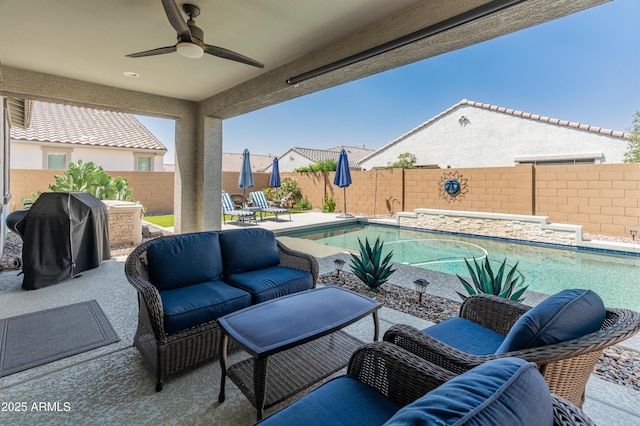 24638 N 144th Ave, Surprise, AZ 85387 - view of patio featuring area for grilling, ceiling fan, a fenced backyard, and an outdoor living space