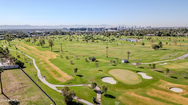 birds eye view of property featuring a mountain view