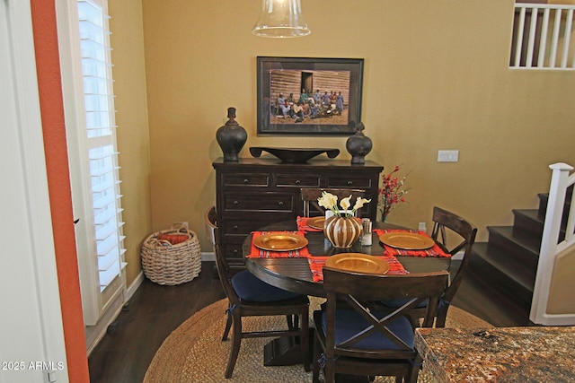 15221 N Clubgate Dr Unit 2044, Scottsdale, AZ 85254 - dining area featuring wood finished floors and stairway