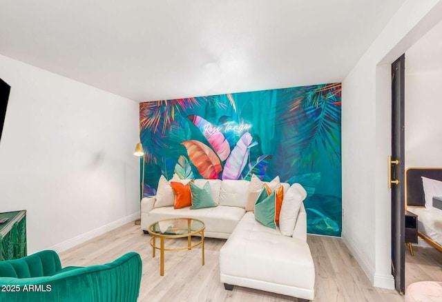 8437 E Bonnie Rose Ave, Scottsdale, AZ 85250 - living room with an accent wall, wood finished floors, and baseboards