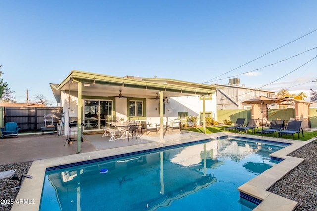 8437 E Bonnie Rose Ave, Scottsdale, AZ 85250 - view of swimming pool with a patio area, fence, and a ceiling fan