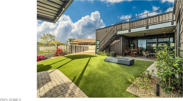 908 W Caldwell St, Phoenix, AZ 85041 - view of yard with a patio, a fenced backyard, and stairway