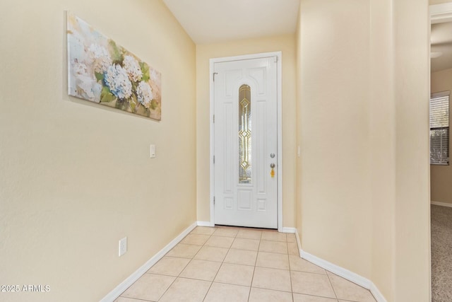 entryway featuring light tile patterned flooring