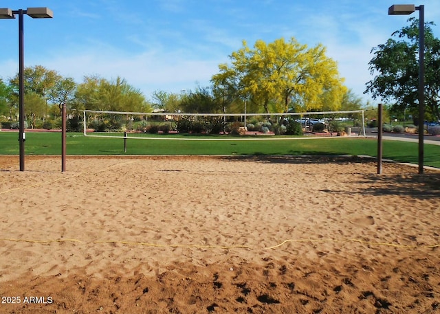 view of property's community with a yard