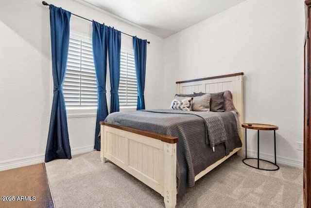 11249 N Blakely St, Surprise, AZ 85388 - bedroom featuring baseboards and light colored carpet