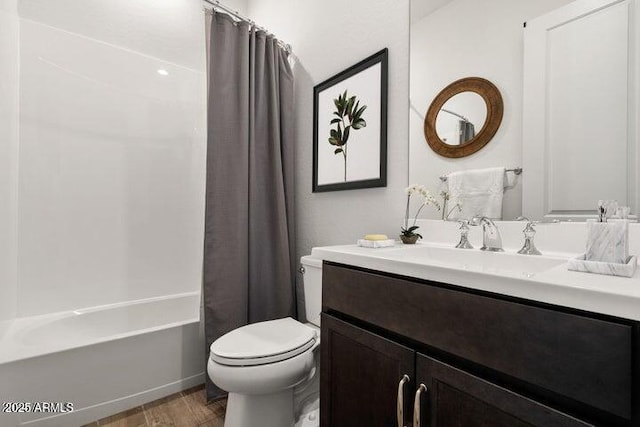 11249 N Blakely St, Surprise, AZ 85388 - bathroom featuring wood finished floors, toilet, vanity, and shower / bath combination with curtain