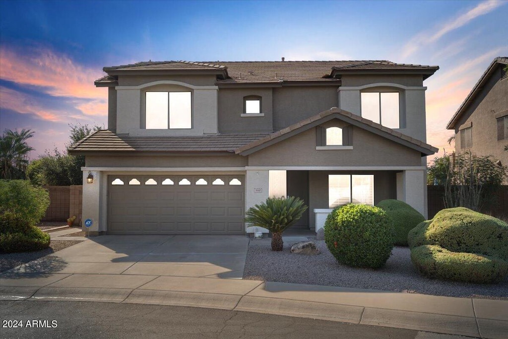 front of property featuring a garage