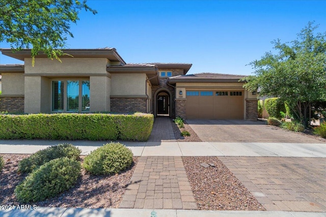 prairie-style house with a garage