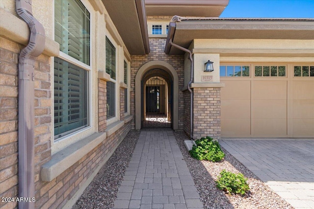 property entrance featuring a garage