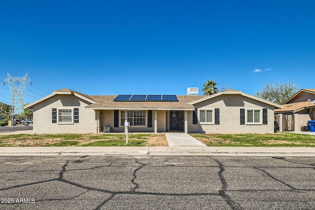 624 N Ashbrook Cir, Mesa, AZ 85213 - ranch-style house with roof mounted solar panels, stucco siding, and covered porch