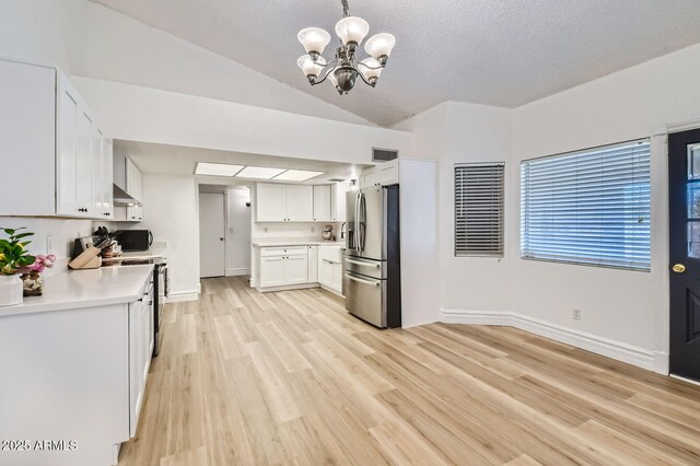 624 N Ashbrook Cir, Mesa, AZ 85213 - kitchen featuring appliances with stainless steel finishes, a chandelier, light countertops, white cabinets, and light wood-type flooring