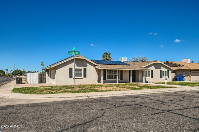 624 N Ashbrook Cir, Mesa, AZ 85213 - single story home with stucco siding and solar panels