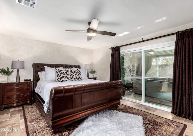 bedroom with access to exterior and ceiling fan