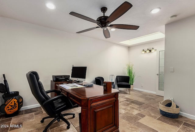 office space featuring ceiling fan