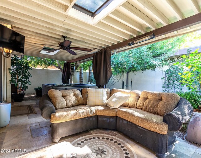 view of patio / terrace featuring ceiling fan