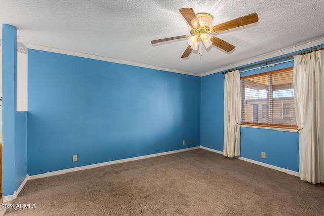 spare room with carpet flooring, ceiling fan, a textured ceiling, and ornamental molding