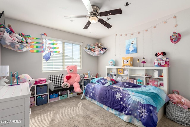 carpeted bedroom with a ceiling fan