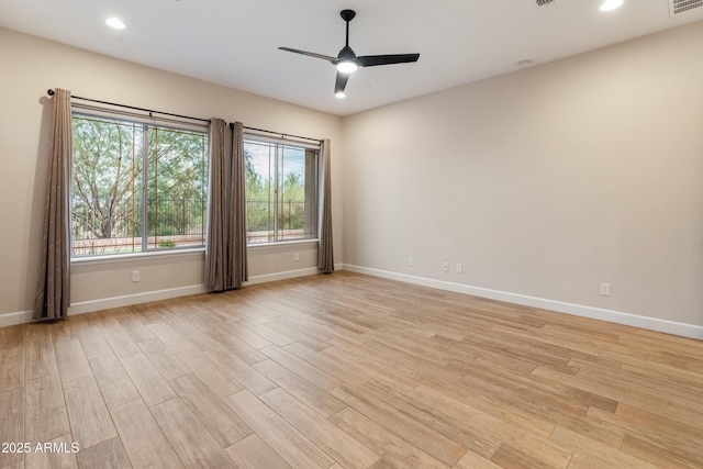 31207 N 124th Dr, Peoria, AZ 85383 - unfurnished room with a ceiling fan, baseboards, light wood-style floors, and recessed lighting