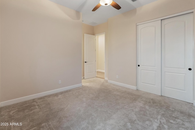 31207 N 124th Dr, Peoria, AZ 85383 - unfurnished bedroom with carpet floors, a closet, baseboards, and a ceiling fan