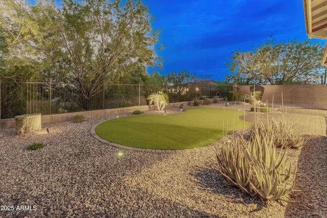 31207 N 124th Dr, Peoria, AZ 85383 - fenced backyard with a putting area