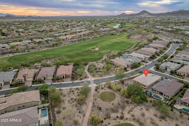 31207 N 124th Dr, Peoria, AZ 85383 - aerial view of property's location with a mountain backdrop, nearby suburban area, and a local golf course
