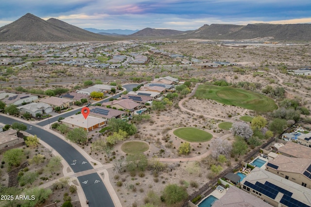 31207 N 124th Dr, Peoria, AZ 85383 - aerial view of property and surrounding area featuring a mountain backdrop and nearby suburban area