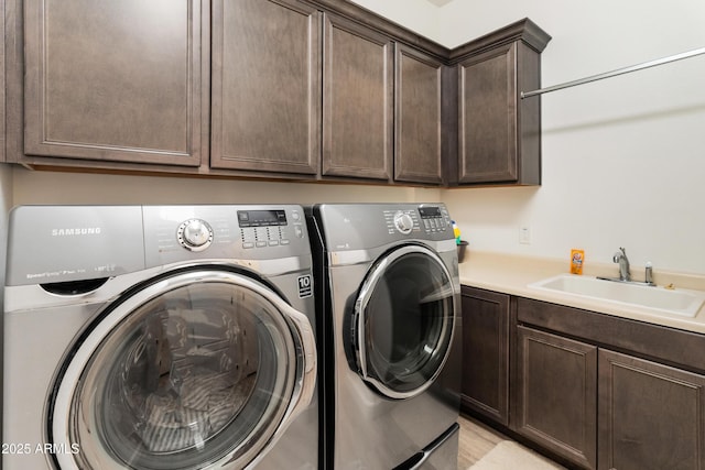 31207 N 124th Dr, Peoria, AZ 85383 - clothes washing area featuring cabinet space and separate washer and dryer