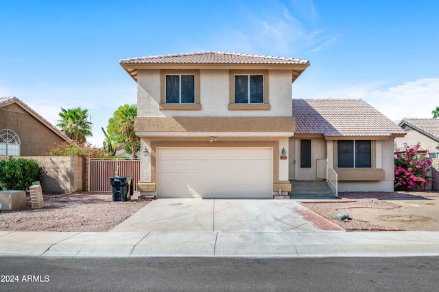 view of front of home with a garage