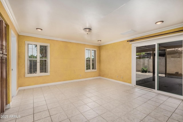 1549 N La Rosa Dr, Tempe, AZ 85288 - spare room featuring ornamental molding and healthy amount of natural light