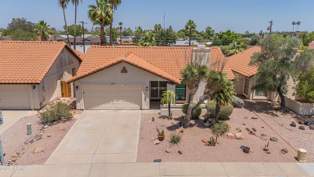 1549 N La Rosa Dr, Tempe, AZ 85288 - view of front of house featuring a tiled roof, concrete driveway, a garage, stucco siding, and a chimney
