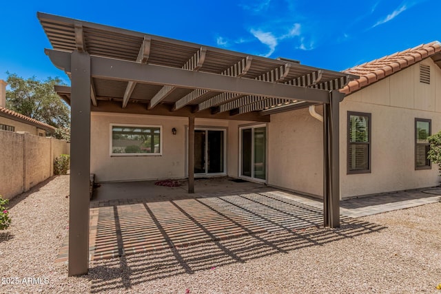 1549 N La Rosa Dr, Tempe, AZ 85288 - rear view of house featuring stucco siding, a tile roof, a patio area, and a pergola