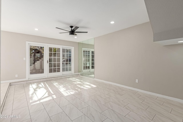 unfurnished room with ceiling fan