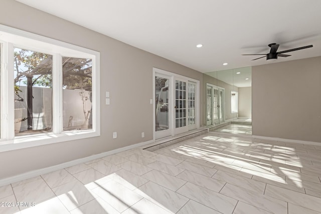 spare room featuring ceiling fan