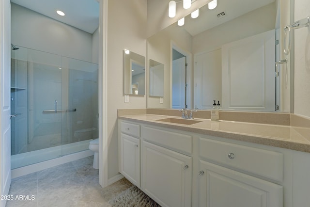 bathroom featuring visible vents, toilet, tile patterned floors, vanity, and a shower stall